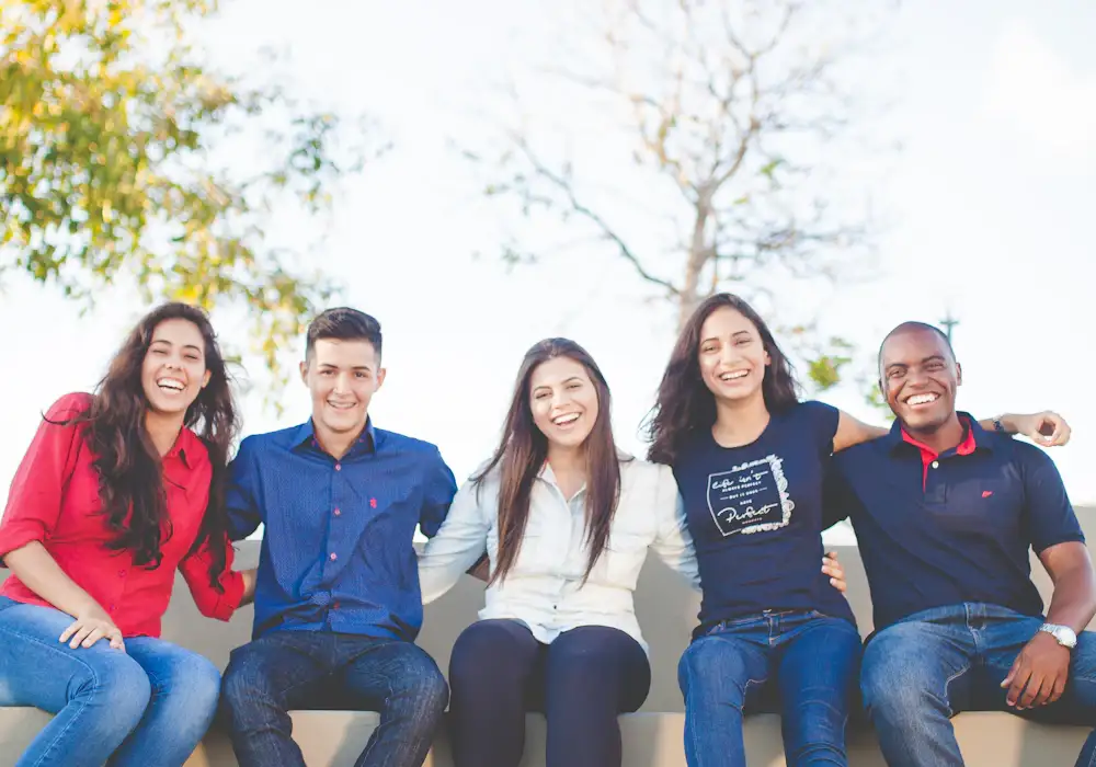 Students sitting together on a college campus